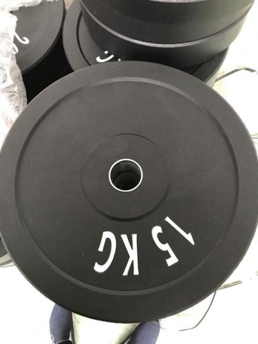 Odhazovac kotoue na olympijskou osu - bumper plates