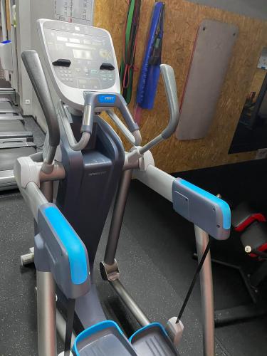 Precor model AMT 835 open stride